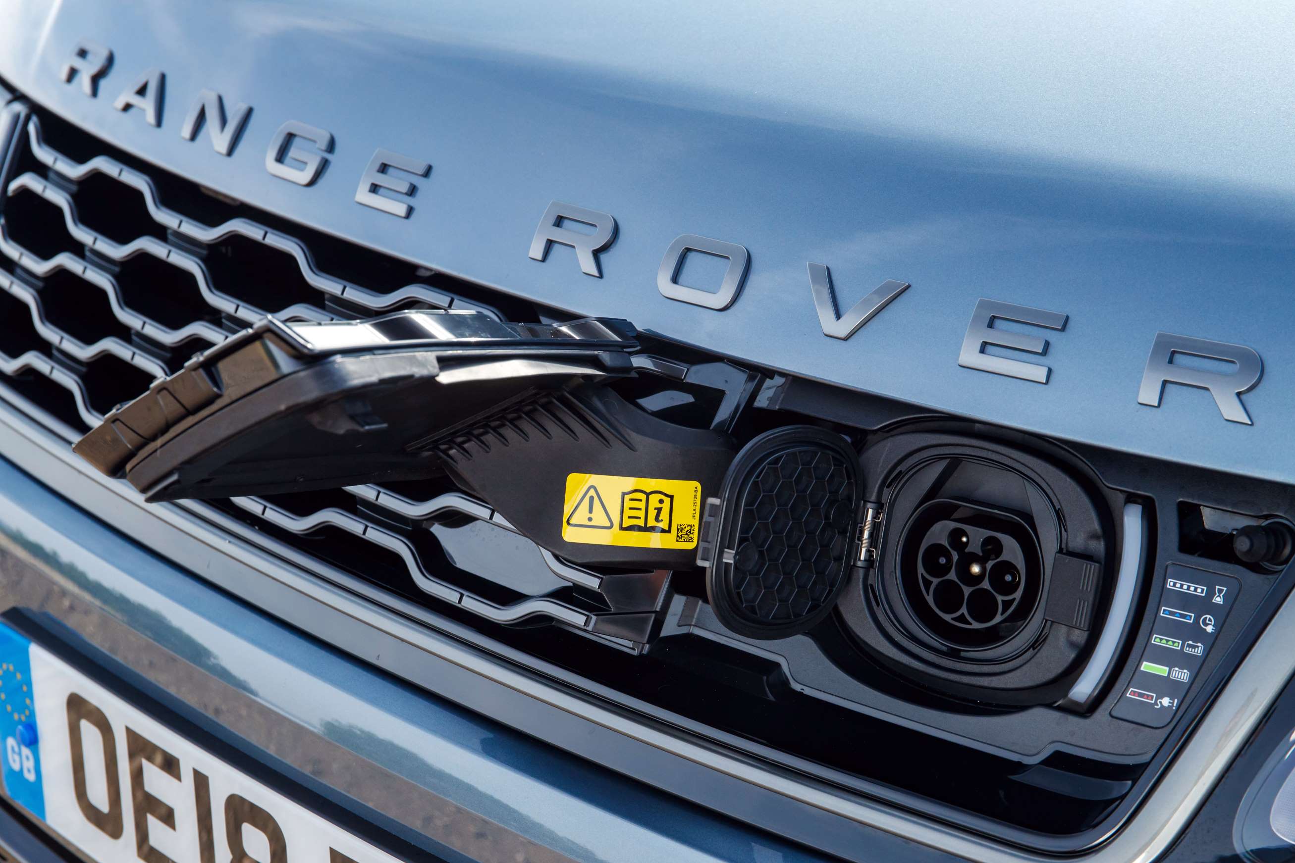 Range Rover Sport p400e badge and charging port